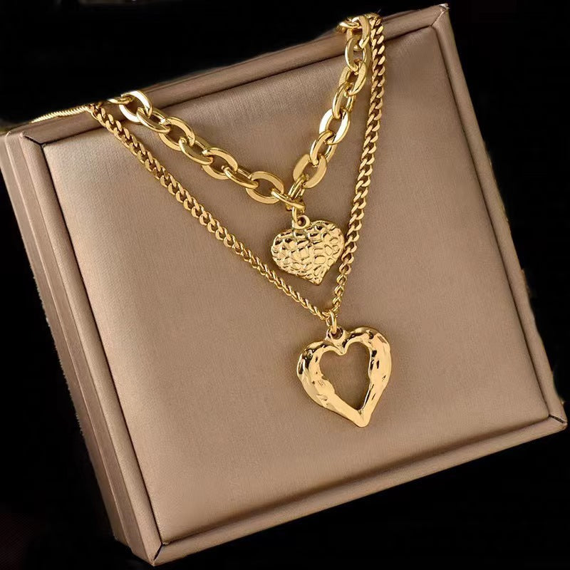 Golden Whisper – Guardian Wings Heart Necklace