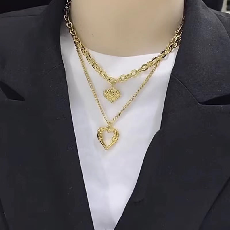 Golden Whisper – Guardian Wings Heart Necklace